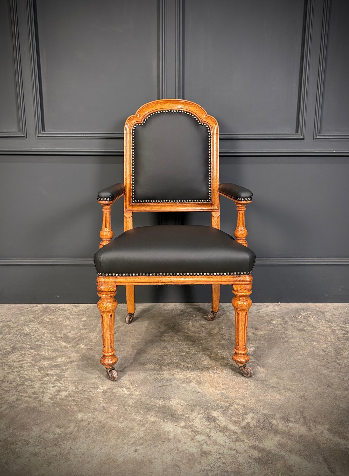 Oak & Leather Armchair by W.Williamson & Sons