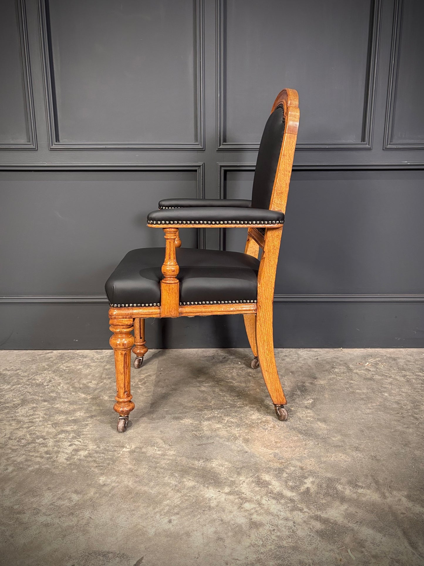 Oak & Leather Armchair by W.Williamson & Sons