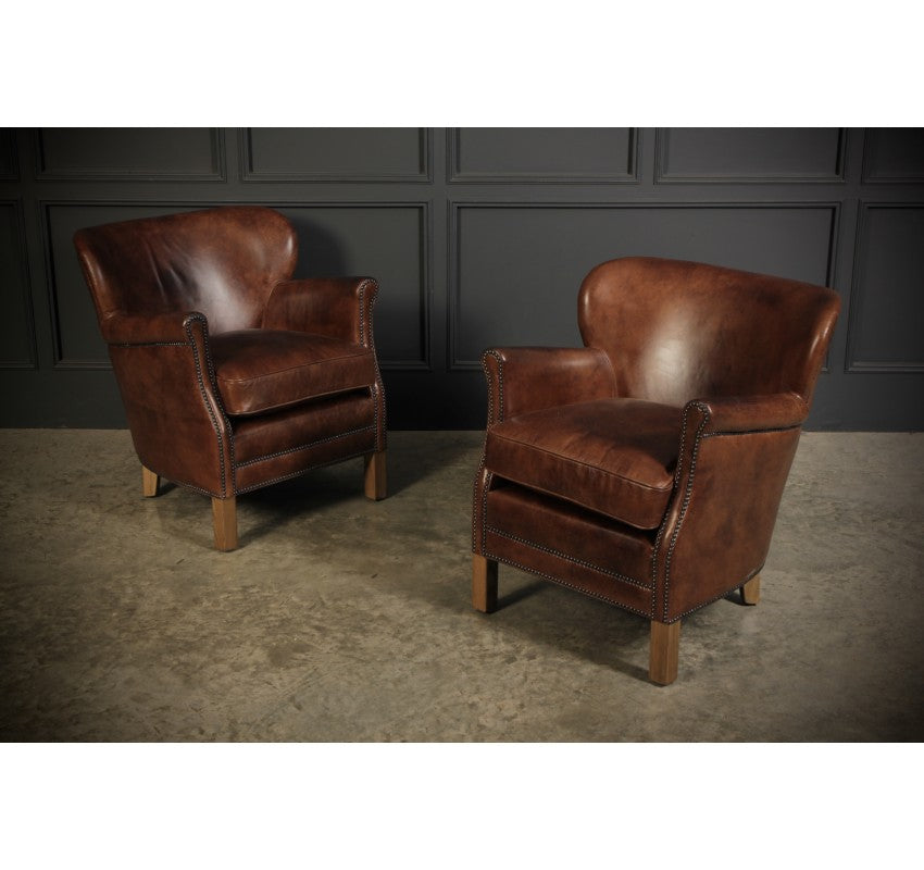 Pair Of Leather Armchairs