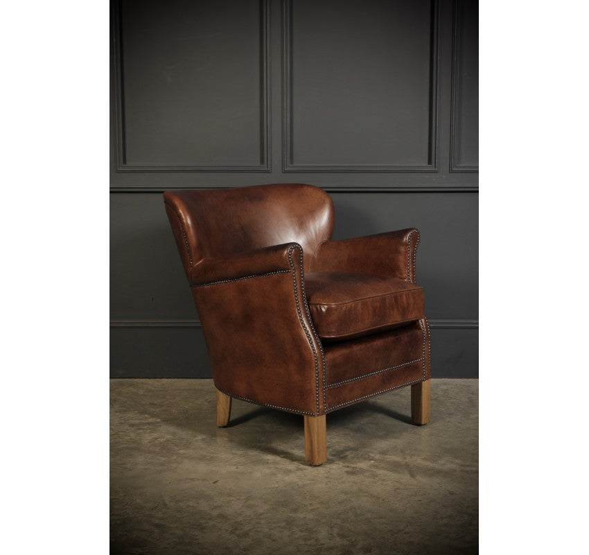 Pair Of Leather Armchairs