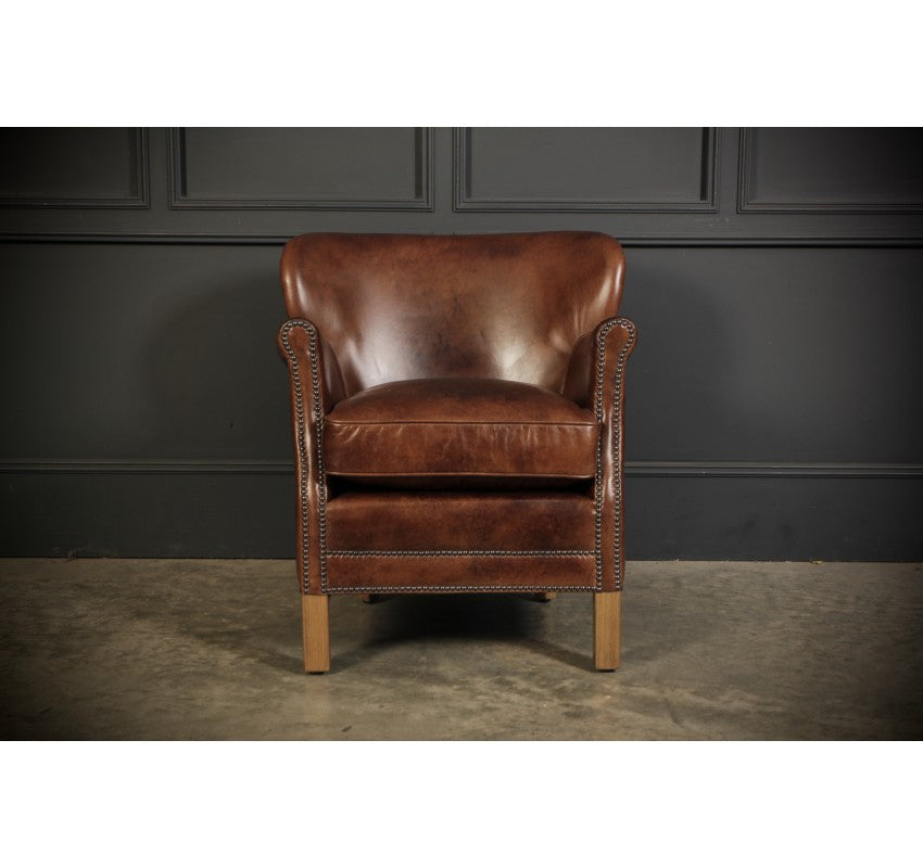 Pair Of Leather Armchairs