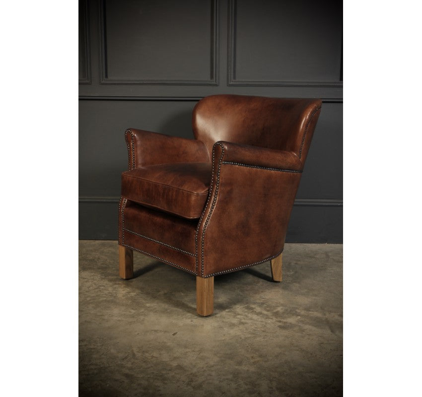 Pair Of Leather Armchairs