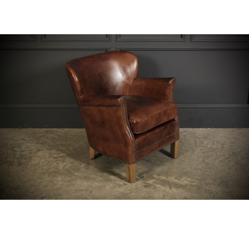 Pair Of Leather Armchairs